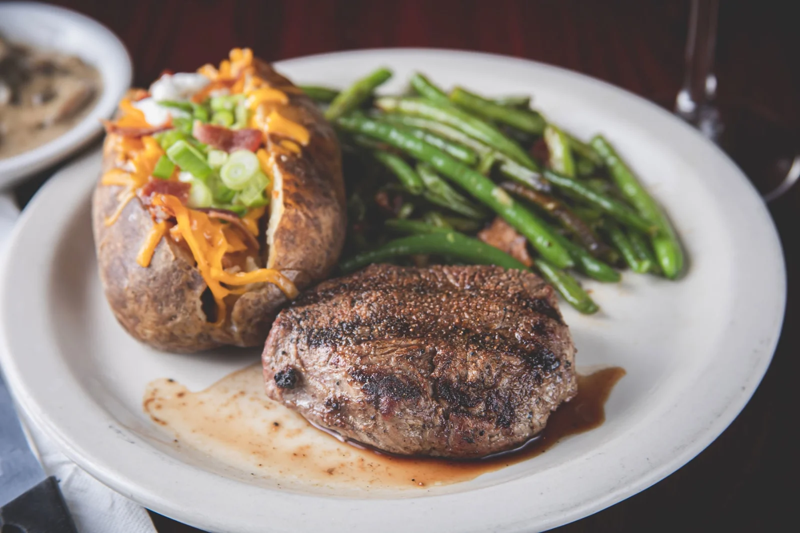 Official Wurst Haus grilled steak plate with potato and asparagus